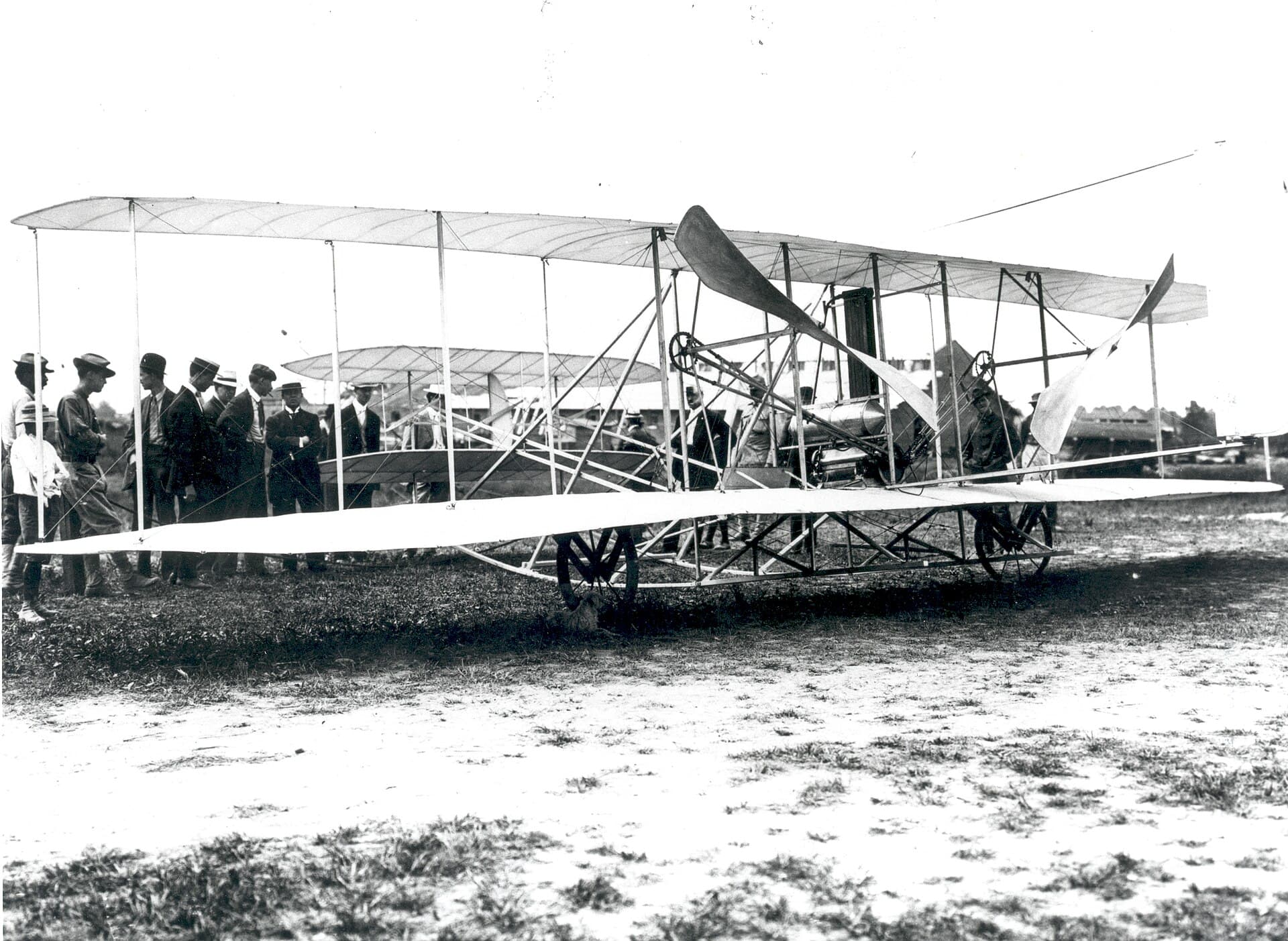 A Wright Flyer with spectators at Fort Myer, Virginia, during the 1908 public demonstrations.