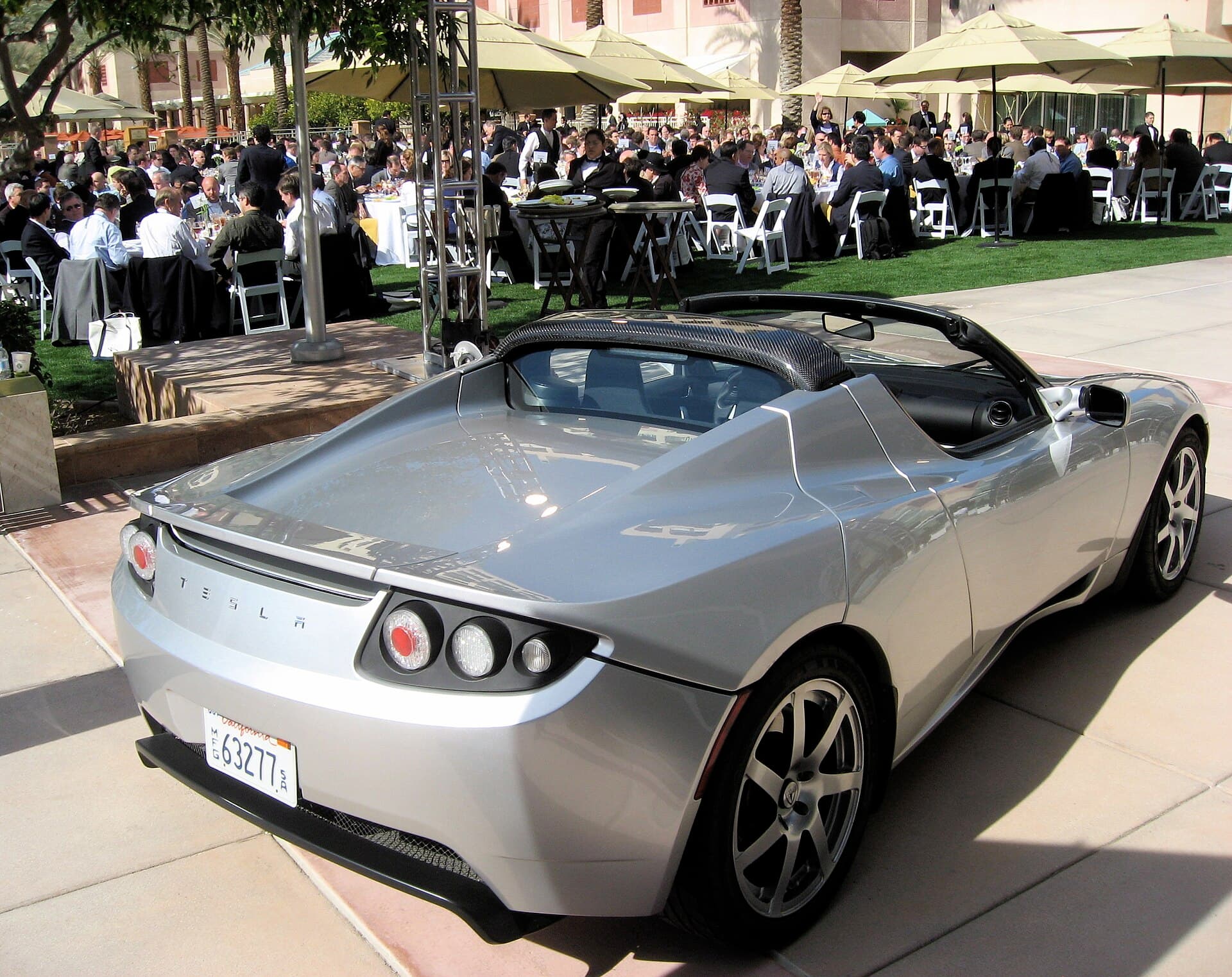 An original Tesla Roadster at an early company event.